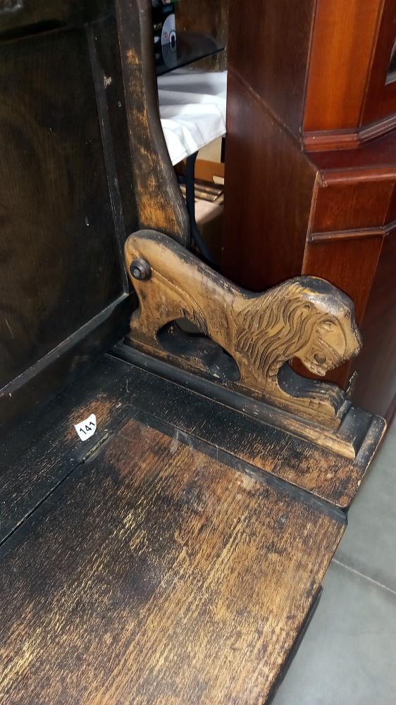 An oak monks bench with carved lions arms COLLECT ONLY - Image 3 of 4