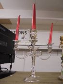 A five branch silver plate candelabra.