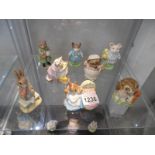 Eight Beswick Beatrix Potter figurines including Simpkin.