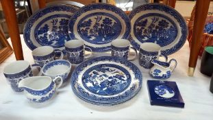A quantity of blue and white Churchill plates, mugs etc