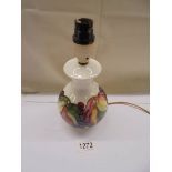 A Moorcroft table lamp base (needs new plug).