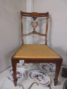 An Edwardian mahogany inlaid nursing chair, COLLECT ONLY.