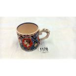 A Burleigh Ware coronation mug for King Edward VIII decorated with a colourful design by Dame