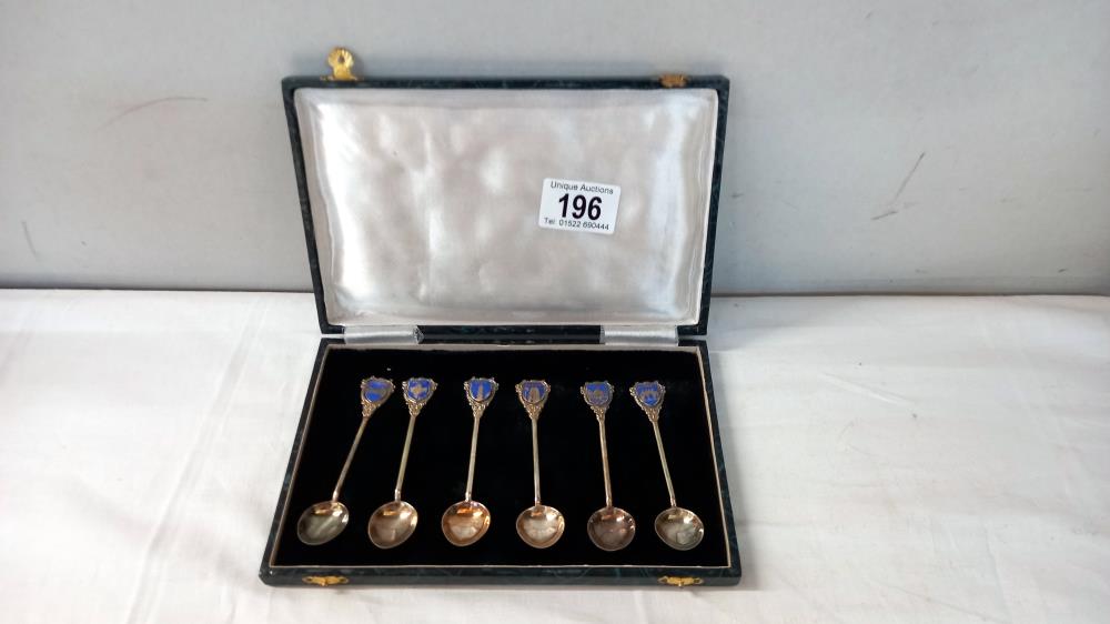 A cased sterling silver teaspoons with enamelled landmarks (Cities of India)