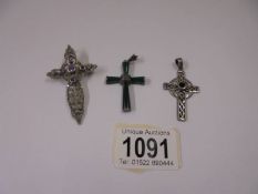 Three silver cross pendants, one set amethyst stones, one set onix stone and one jade.