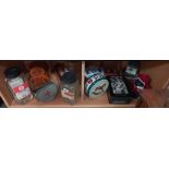 A good selection of tins, vintage sweet shop bottles/jars and a pottery gingerbread man biscuit