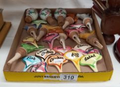 A collection of bottle tops/wine tops and food display plaques