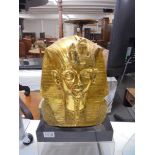 A gilded death mask for Tut-Ankh-Amun.