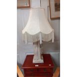 A tall plaster figurine table lamp, titled 'Tuscan' signed M Wood 1946, height 53cm, base 17cm x