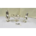 A three piece silver condiment set, 4.2 ounces.