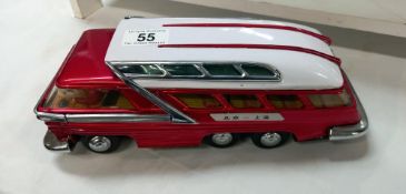 A tinplate ME083 battery operated coach, made in China length 29cm