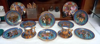 A set of 8 Royal Worcester Legends of the Nile collectors plates, mugs and saucers, Egyptian items