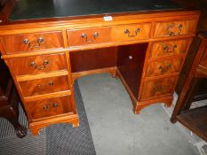 A mahogany kneehole desk, COLLECT ONLY.