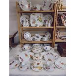 In excess of fifty pieces of pieces of Royal Worcester Evesham pattern table ware. COLLECT ONLY.