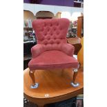 A pink Draylon deep buttoned nursing chair on Queen Anne legs COLLECT ONLY