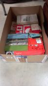 A box of football ephemera including Lincoln City programmes including 1970's, season tickets from