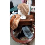 A quantity of fur and faux items including hat and muffs