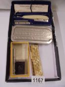 A Durham-Duplex razor, a Rolls razor, Rolls Razor Imperial blades and a cased comb.
