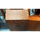 A 1930/50's oak bureau with cross banding inlay COLLECT ONLY