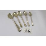 Five assorted silver teaspoons, 3.16 ounces.