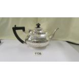 A small silver teapot, 11.5 ounces.