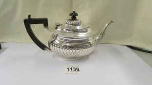 A small silver teapot, 11.5 ounces.