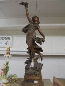 A French bronzed finish figure entitled 'Le Temps des Rose'.