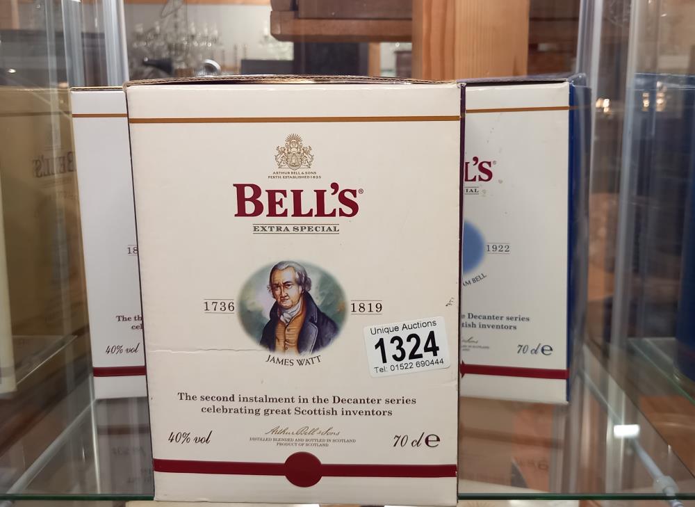 Three boxed Wade Bells whisky decanters - James Watt, Alexander Fleming and Alexander Graham Bell.