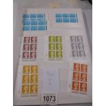 An album containing machine cylinder block sets of stamps.