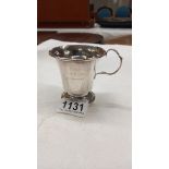 A silver circa 1935 christening mug, 2 ounces.