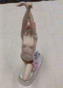 An Art Deco Style, porcelain figure of a redheaded topless dancer, the base printed ‘Wein’,