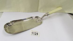 A hall marked silver fish slice/crumb tray, total weight 7.25 ounces.