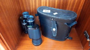 A cased Prinz-Lux 10-50 binoculars