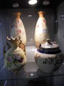A pair of Fieldigs Devonware blossom vases, An HBOL vase ad a Crown Albion biscuit barrel