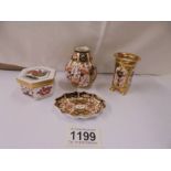 Four items of Royal Crown Derby porcelain.