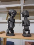 A pair of old carved wood tribal fertility figures, 37.5cm tall.
