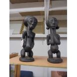 A pair of old carved wood tribal fertility figures, 37.5cm tall.