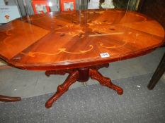 An oval inlaid table on pedestal base, COLLECT ONLY.