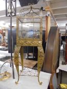A decorative metal and glass terrarium on stand, COLLECT ONLY.