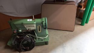 A cased vintage Singer sewing machine COLLECT ONLY