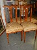 A set of four 20th century mahogany inlaid dining chairs, COLLECT ONLY.