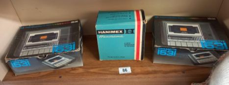 2 boxed commodore datassette cassette players and a Hanimex Hanorama slide viewer