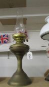 A brass 'Half Nelson' oil lamp with chimney. COLLECT ONLY.