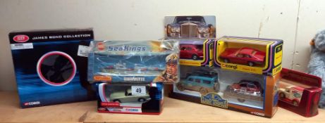 A collection of boxed diecast including James Bond collection (tin inside box is still sealed),