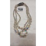 A superb quality three strand crystal necklace.