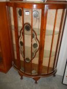 A 1930's dome front display cabinet, COLLECT ONLY.