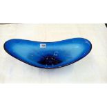 A large mid 20th century Swedish Art glass table centre, the heavy boat shape body in Cobalt Blue.