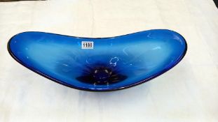 A large mid 20th century Swedish Art glass table centre, the heavy boat shape body in Cobalt Blue.