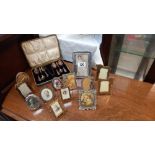 A selection of vintage picture frames including art deco style and a cased set of teaspoons