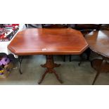 An octagonal mahogany tea table on centre column, 92cm x 61cm x 78cm high, COLLECT ONLY